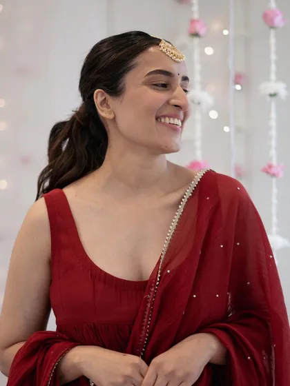 A candid shot of the Alia-inspired look. It's a testament to how a simple ponytail can be elevated to a stunning bridal or festive style.
