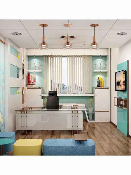 This director's cabin uses a brighter, more colorful palette with aqua and blue accents. The design includes a glass-top desk, copper pendant lights, and informal seating, creating a vibrant and approachable executive space.
