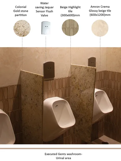 This annotated image details the urinal area in the gents' washroom. We used colonial gold stone for the partitions and specified water-saving sensor flush valves, blending classic aesthetics with modern, sustainable technology.