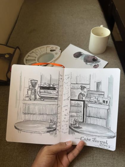 The full spread of my Cafe Journal sketch. I love filling my sketchbook with memories of places I've been.