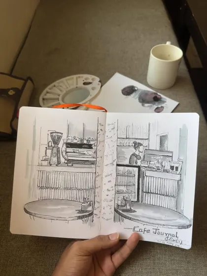 The full spread of my Cafe Journal sketch. I love filling my sketchbook with memories of places I've been.
