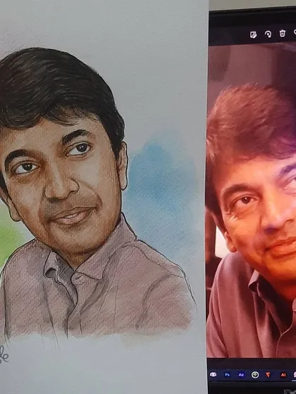 The finished watercolor portrait next to the reference photo, showing the artistic interpretation.