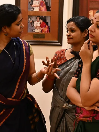 A moment of intense discussion during rehearsals for "Songs of the Millstone". My workshops are collaborative spaces where we explore movement and meaning together.