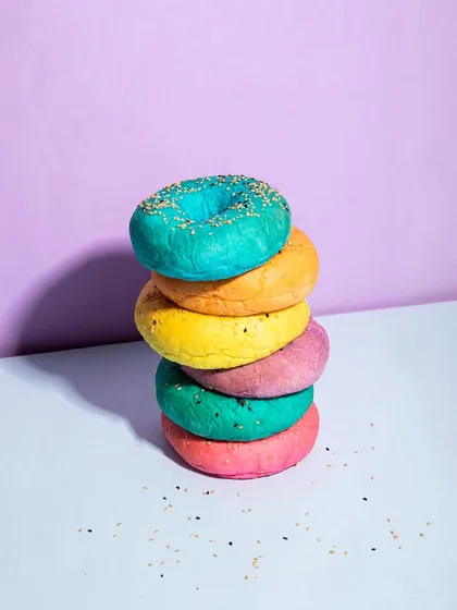 A stack of my colorful Holi-themed bagels. These are perfect for adding a splash of fun to your festive breakfast spread.