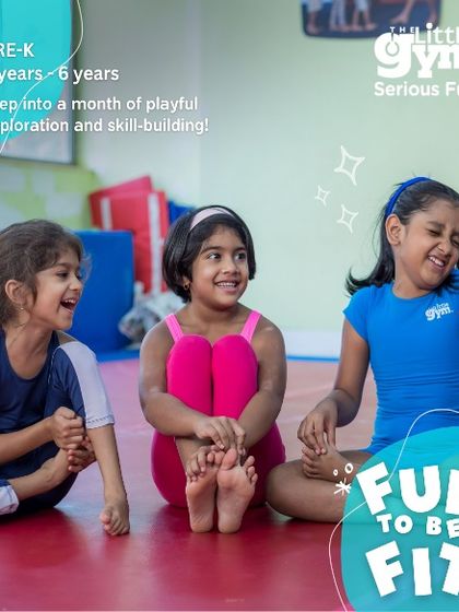 Three young friends share a laugh during a stretching exercise. My classes are designed to be social and fun, creating a positive atmosphere where kids build friendships while improving their fitness.