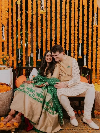 Love and laughter are the best accessories for my mehndi designs. A beautiful portrait of a couple enjoying their celebration.