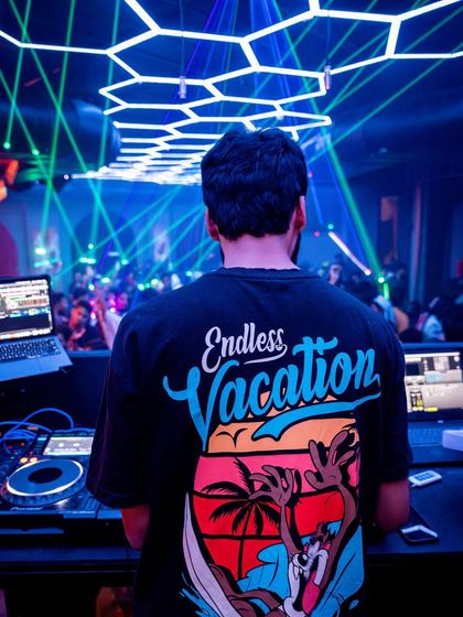 The view from my back at Raw Experience, with the lasers creating a web above the crowd.