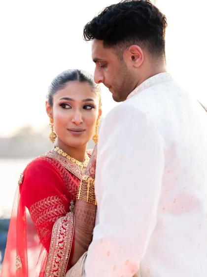 A close-up of the couple during their wedding portraits, with the bride looking lovingly at the groom. The soft light is incredibly flattering.