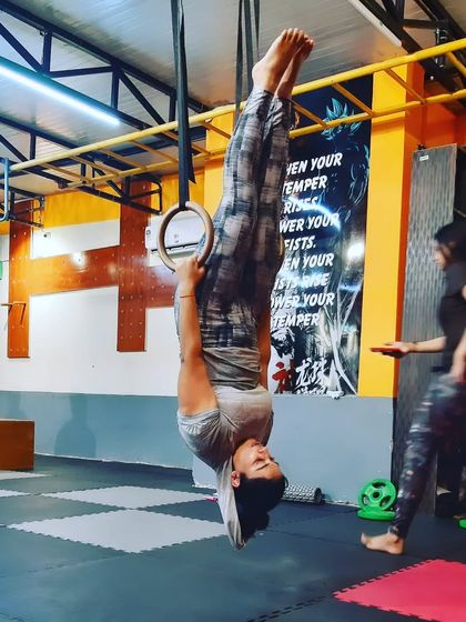 Using gymnastic rings for inverted poses adds an element of instability, forcing your core to work harder to maintain balance.