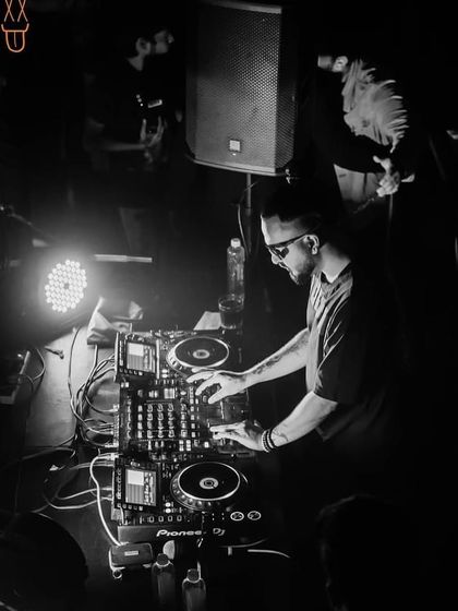 At the console during a Bolly-Tech and Techno night at The Fixx. These nights are all about darker, driving beats mixed with familiar desi hooks.