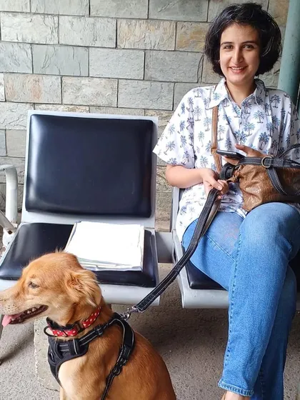 A client with her Golden Retriever waiting for their appointment. The AQCS office is a familiar place for me and my team.