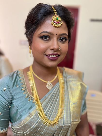 Smokey eyes and deep berry lips for Dr. Mithra’s engagement. This look is bold and beautiful, perfect for making a statement.