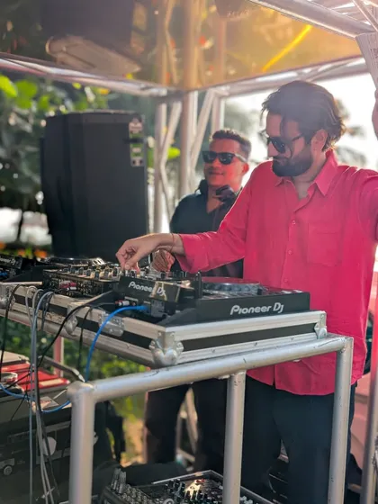 A candid moment during a Goa wedding. It's always fun when guests get involved and share their excitement for the music.