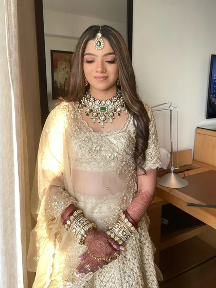 The sunlight beautifully highlights Mahek's dewy skin. This look is all about achieving that 'glass-skin' finish that looks healthy and radiant.