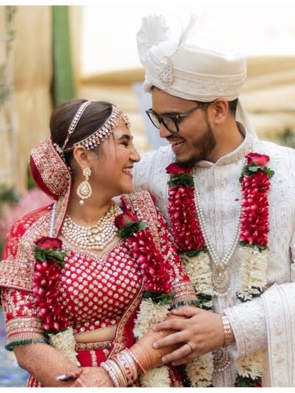 A sweet portrait of the couple looking at each other with love after their wedding ceremony. These are the timeless images you'll treasure forever.