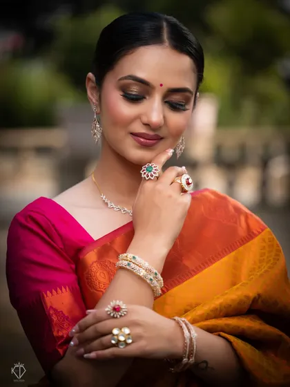A close-up portrait focusing on the model's hands and jewelry, demonstrating my skill in capturing fine details for commercial clients.
