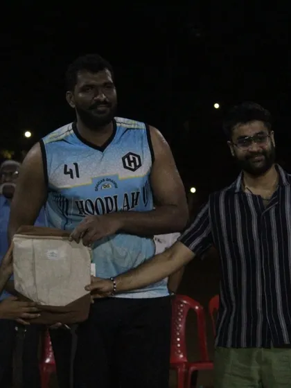 Men's MVP Bala receiving his award. His performance throughout the tournament was a showcase of skill and leadership.