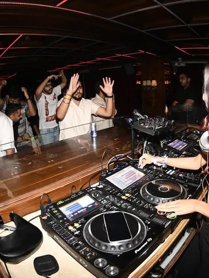 This is my favorite view, right from the DJ booth, watching the crowd get lost in the music. I feed off this energy, mixing tracks live to match the vibe and keep everyone grooving until the lights come on.