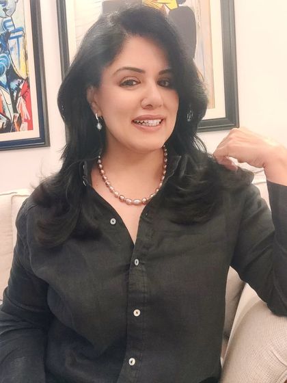 For a simple black shirt dress, a string of pink baroque pearls adds a soft, feminine touch and a hint of colour. It’s an easy way to dress up a minimalist outfit.