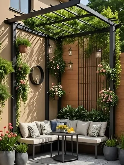 A cozy and lush seating nook created by a metal pergola against a wooden wall. The space is filled with hanging and potted plants, creating a private, garden-like feel in a small area.