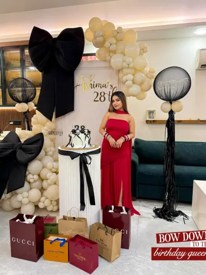We wrapped up Ashima's 28th birthday with bows and love! This chic and modern setup featured oversized black bows, a custom backdrop, and a sophisticated palette of cream and black balloons. It’s proof that birthday decor can be both fun and incredibly stylish.