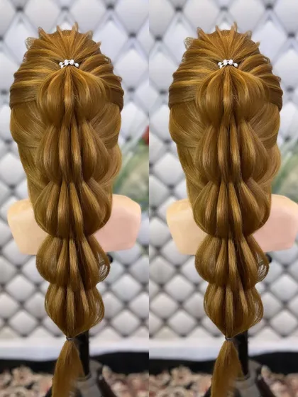 A beautiful open hairstyle with a bubble braid effect.