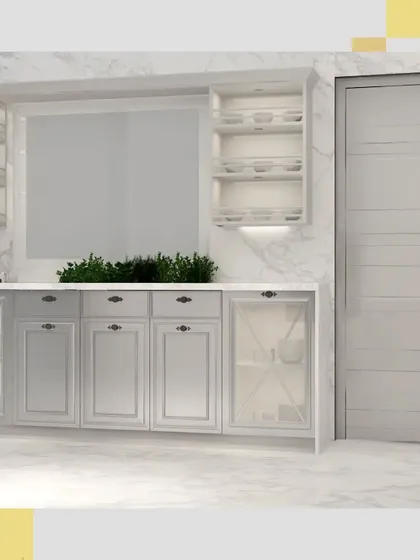 A view of the counter area, showing the classic panelled drawers and glass-fronted cabinets, perfect for storing everyday items.