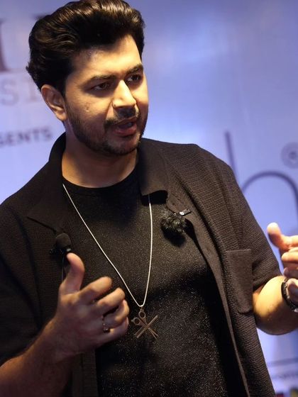 Speaking to the audience during a live show. I love sharing my passion and connecting with fellow hair enthusiasts.