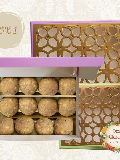 Our Diwali gift boxes are as beautiful as the sweets inside. This box with a delicate laser-cut lid is filled with our wholesome Gond Saunth Ladoos.