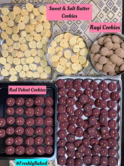 Freshly baked trays of my most popular cookies: Red Velvet, Sweet & Salt Butter, and healthy Ragi cookies.