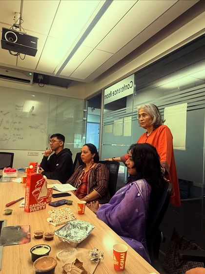 Kalpana guiding the group through a complex psychological concept. Her expertise as a psychotherapist is essential to the unique depth of this advanced characterization workshop.