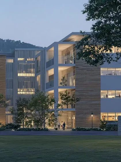 This evening render showcases our exploration of massing and light for a new educational institute in North Karnataka. The design features open balconies and varied facade treatments with wood and louvers, creating a dynamic play of light and shadow that gives the building a lightweight, modern feel.