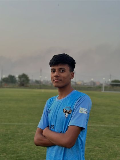 A player poses with a look of determination. This is the focus required to become a champion.