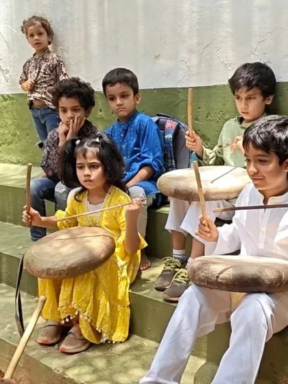 Children learn to play the parai, a traditional folk drum, during our Independence Day celebration. We believe in connecting children to the diverse cultural expressions of our country.