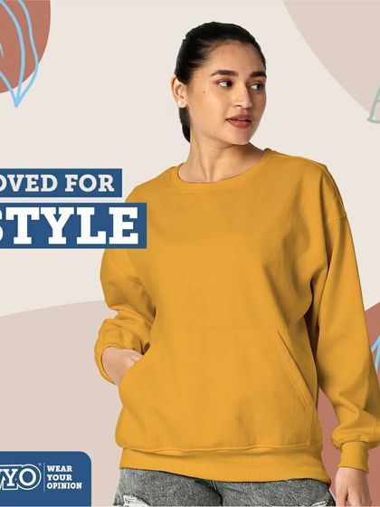 A mustard yellow oversized sweatshirt, loved for its style and comfort.