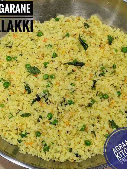 This is Vaggarane Avalakki, a light and savory dish made with flattened rice, tempered with mustard seeds, curry leaves, and green peas. It's a perfect quick breakfast or evening snack.