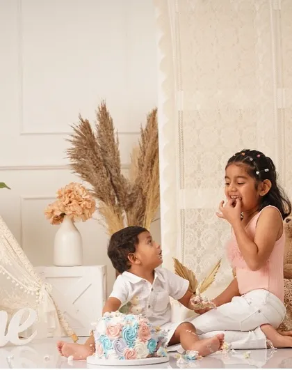 Another adorable shot from this sibling smash cake photoshoot.