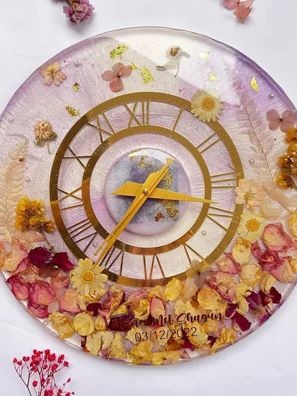 A full view of the 12-inch lavender-themed resin clock. It's a perfect example of how we can create a piece to match your wedding colors.