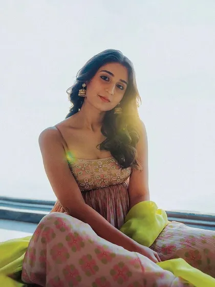 A sun-kissed shot of our client in the same anarkali, highlighting the delicate embroidery on the bodice.