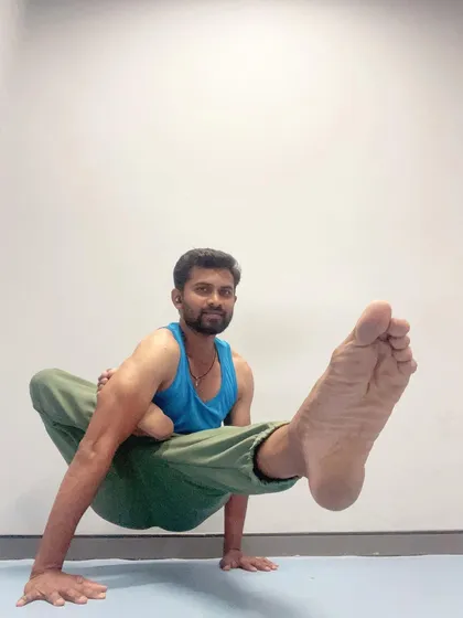 This arm balance, Eka Hasta Bhujasana or Elephant's Trunk Pose, builds incredible strength in the wrists, arms, and core.