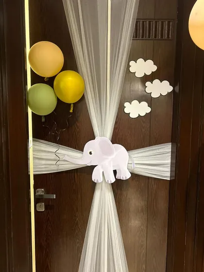 A closer look at the elephant door hanger, a sweet first sight for the family and guests.