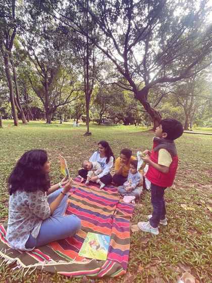 A series of photos from our 'Storyscapes 16' session, capturing the authentic, unposed moments of our circle. You can see children listening, playing, and interacting naturally, which is the essence of our child-led storytelling approach.