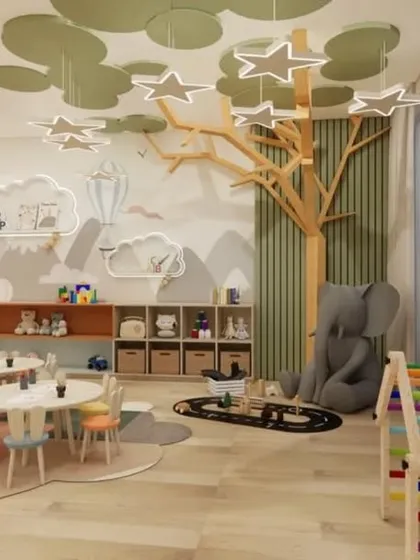 This crèche interior combines vibrant colors, soft textures, and playful elements like a rainbow ladder and star-shaped lights to create a nurturing and stimulating haven for little ones.