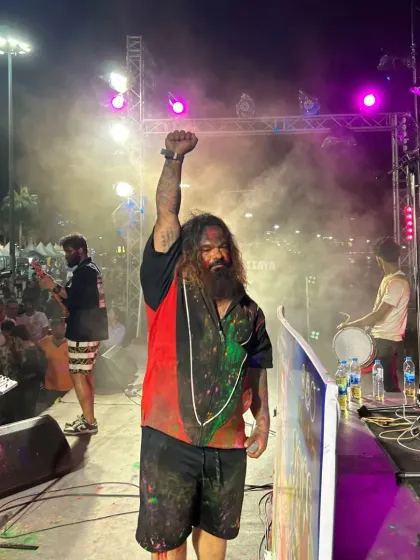 Taking the madness international! Here we are, covered in colors and sweat, during a massive Holi festival in Pattaya, Thailand. It shows we can bring our high-energy Bollywood rock party to any stage, anywhere in the world.