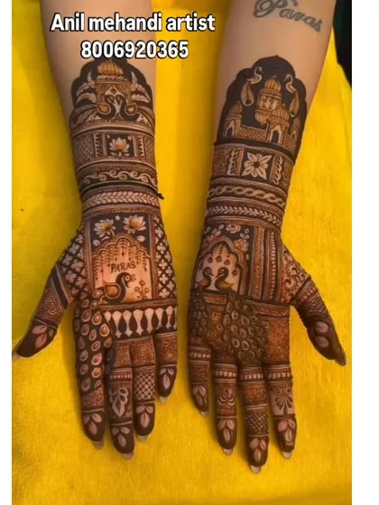 This is the kind of intricate bridal mehandi I specialize in. Notice the fine details, including the shaded peacock on one palm and the palace architecture on the forearm, creating a complete story for the bride's big day.