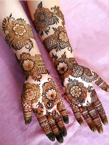 This is a perfect example of our 3D Indo-Arabic fusion style. We've combined bold, shaded lotus and rose motifs with delicate vines and fine line work, creating a design that is both full and breathtakingly detailed for any grand celebration.
