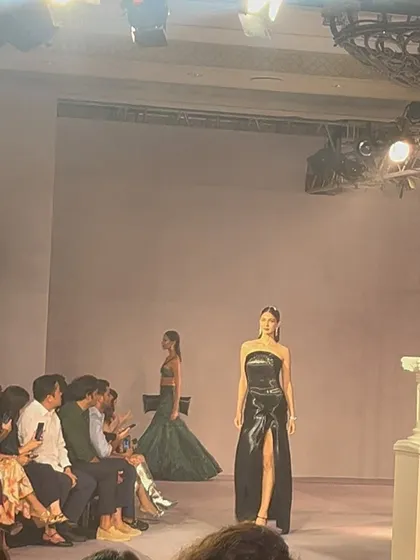 Another stunning design on the runway. The energy and artistry at these shows are a constant source of inspiration for my work in fashion law.