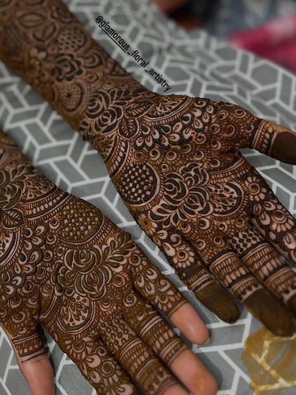 A close-up view of the detailed floral and checkerboard patterns, showing the precision and care that goes into every bridal design.