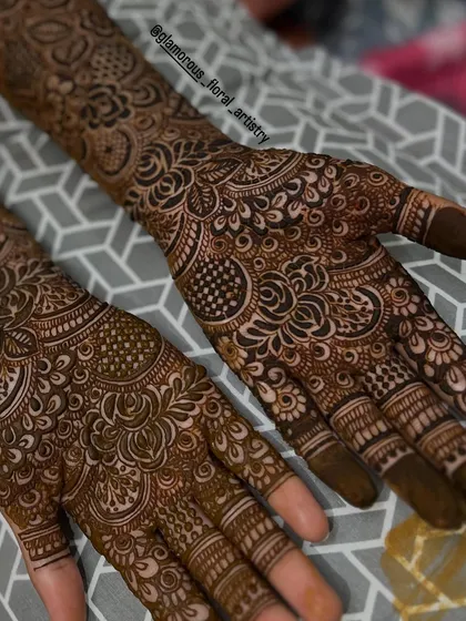 A close-up view of the detailed floral and checkerboard patterns, showing the precision and care that goes into every bridal design.
