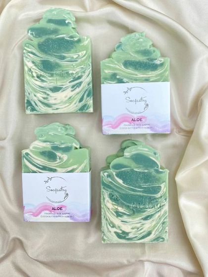 A fresh batch of my Aloe soap, ready to be packaged! I love the frosted tops, which I create by hand for that extra special touch.